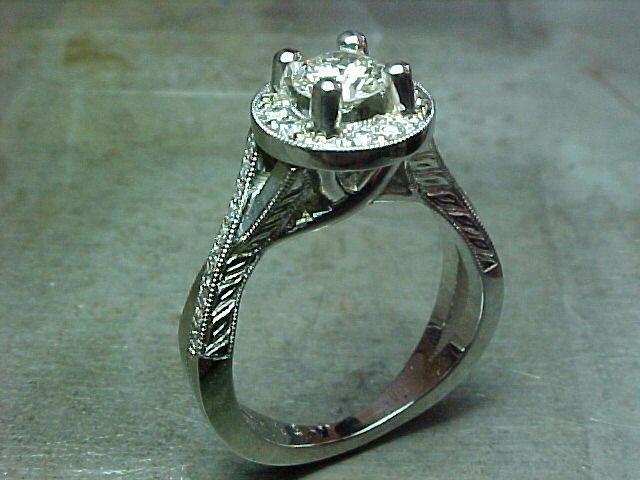 custom twist engagement ring with halo settinga nd custom engraving