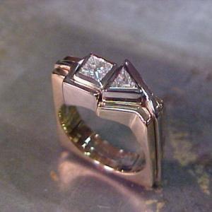custom ring with white gold band and square and triangle center diamonds side view