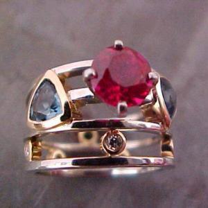 custom gold ring with rubies and sapphires