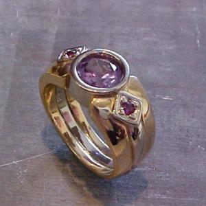 custom gold ring with purple gems