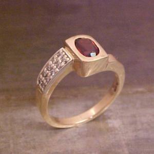 gold ring with ruby gem