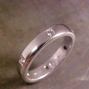 custom white gold wedding band with diamond accents
