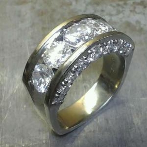 white gold with diamonds along side top view