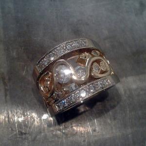wide band custom swirl design with diamonds and leaves