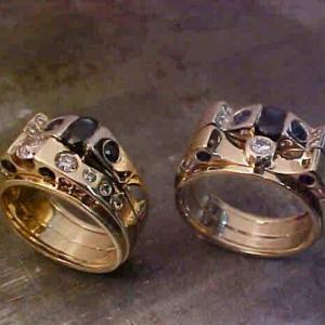 masculine couples matching rings with gold and black diamonds