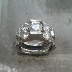 custom designed ring with many large diamonds