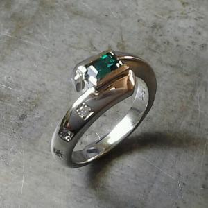 custom ring with square emerald center stone