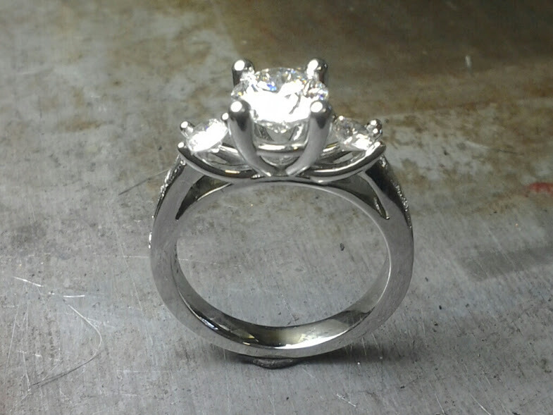 3 stone w prong engagement ring