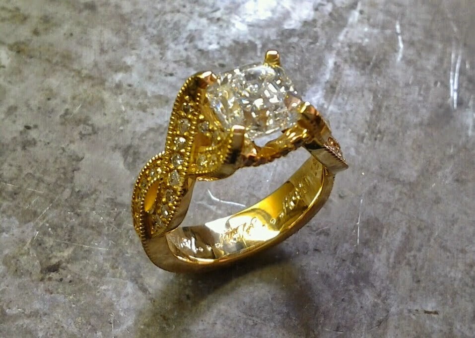 Asscher cut yellow gold engagement ring