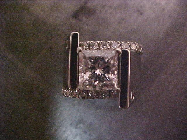 princess diamond offset engagement ring