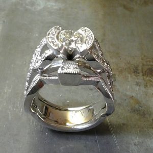 open bezel engagement ring