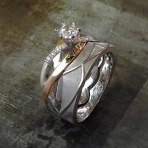2 tone weblike engagement ring and wedding band