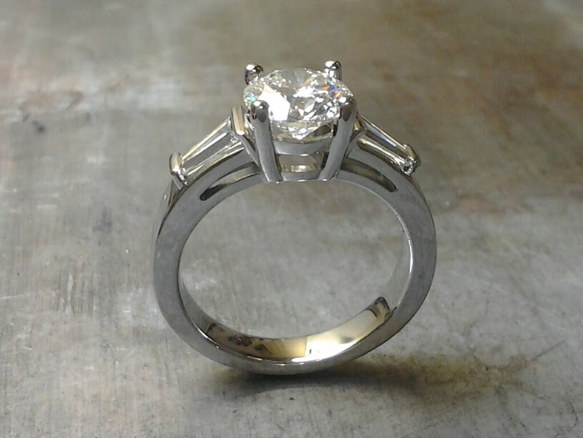 19k Engagement ring with tapered baguette accents