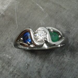 Diamond emerald sapphire engagement ring