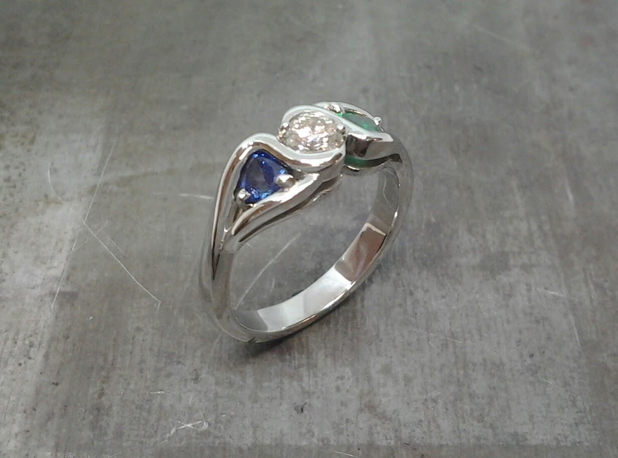 Diamond emerald sapphire engagement ring