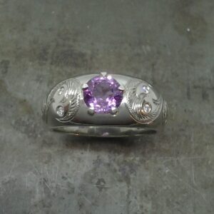 19k Purple sapphire 5 claw scroll engagement ring