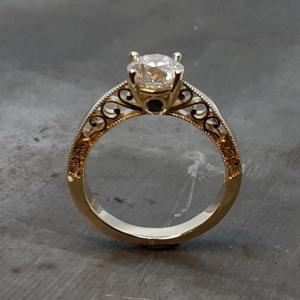 Scroll 19k engagement ring