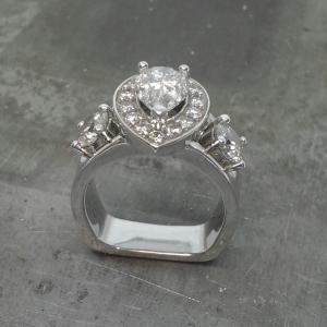 flat bottom white gold pear diamond halo engagement ring