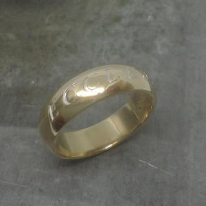 14k yellow gold wedding band with lettering
