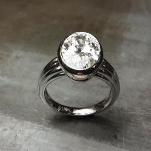 3ct. oval diamond 19k white gold engagement ring