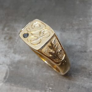 Engraved ruby signet ring